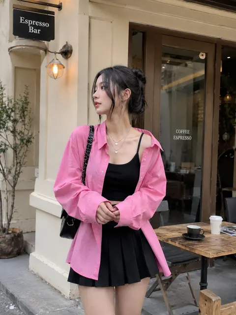 Stylish woman pink shirt espresso cafe