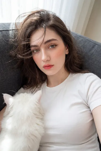 Young woman kissing white cat selfie 8k photo