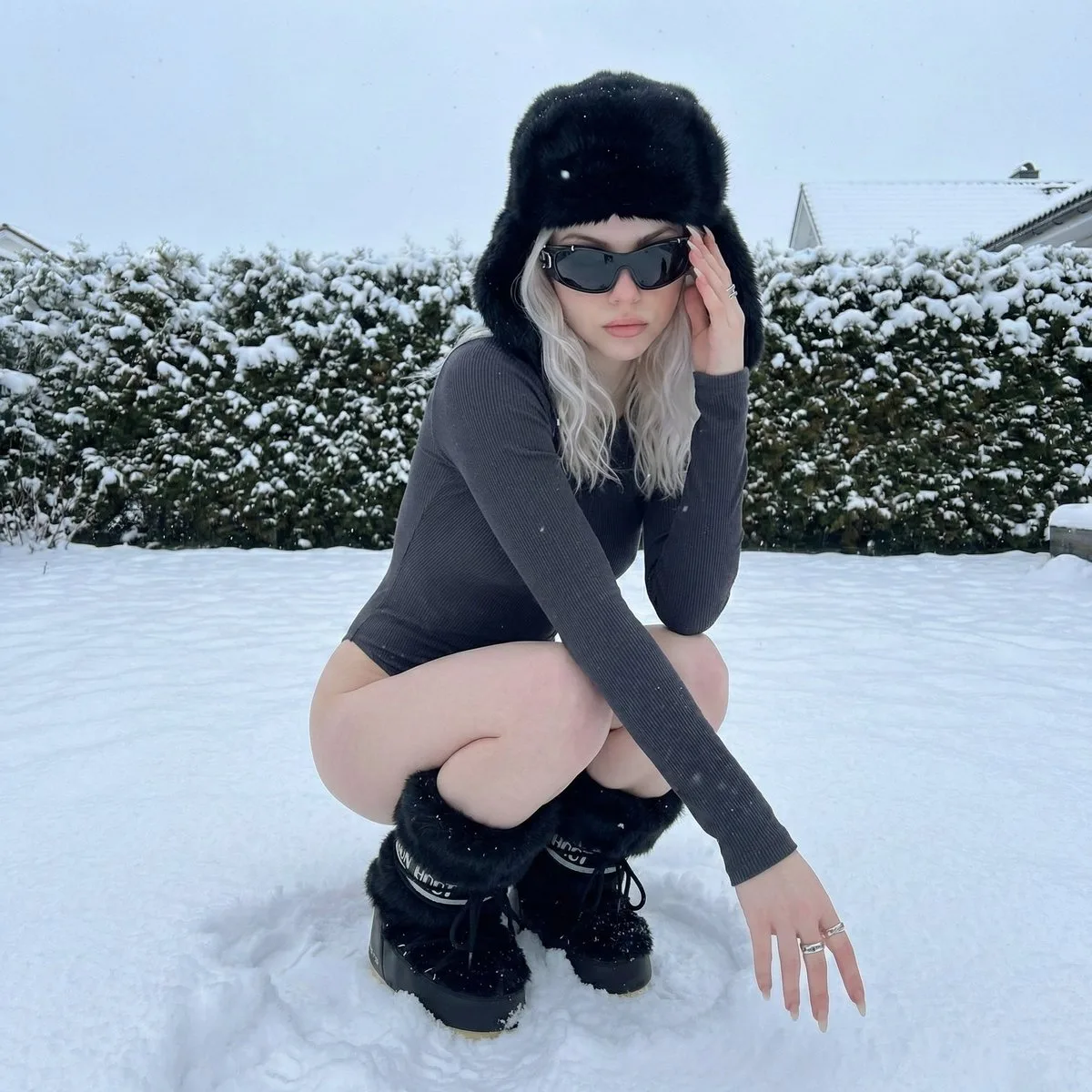 Icy platinum girl snow squat fashion — After