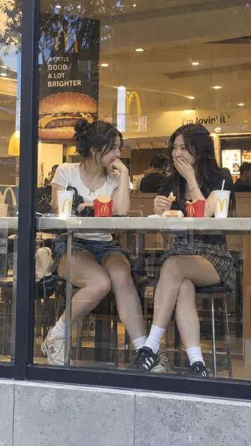 Ultra realistic mcdonalds street photography east asian women