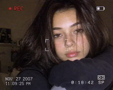 Early 2000s indoor digicam minidv camcorder portrait