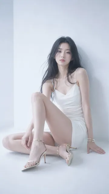 Cold emotional white studio fashion portrait asian woman
