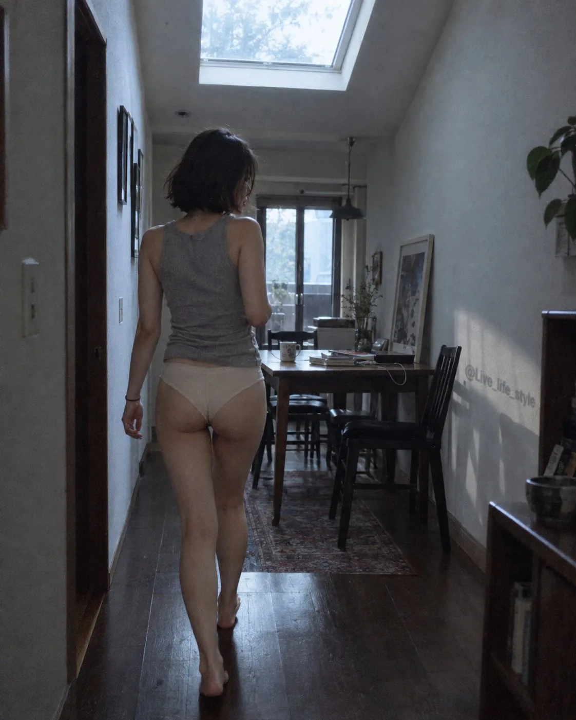 Japanese woman living space back view snapshot — After