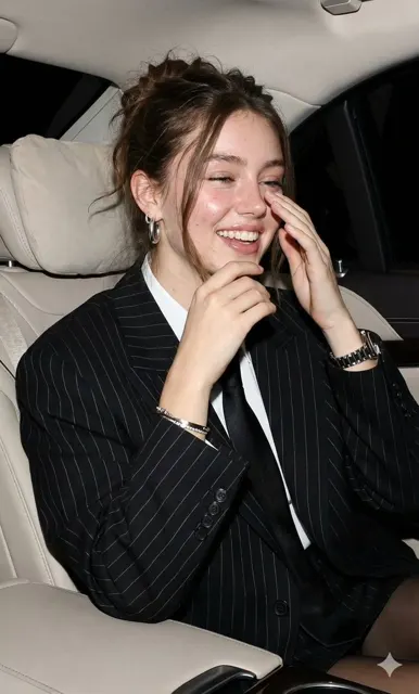 Laughing in luxury car flash