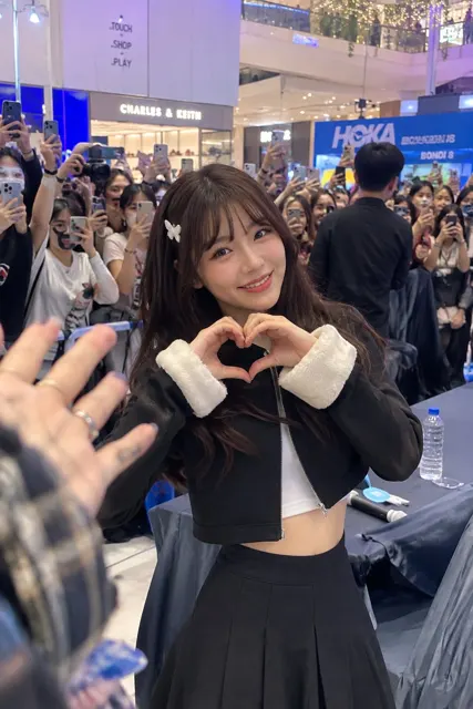 Cheerful young woman fan event portrait