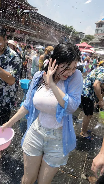 Iphone candid east asian woman water festival