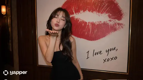 Young east asian woman blowing kiss modern art