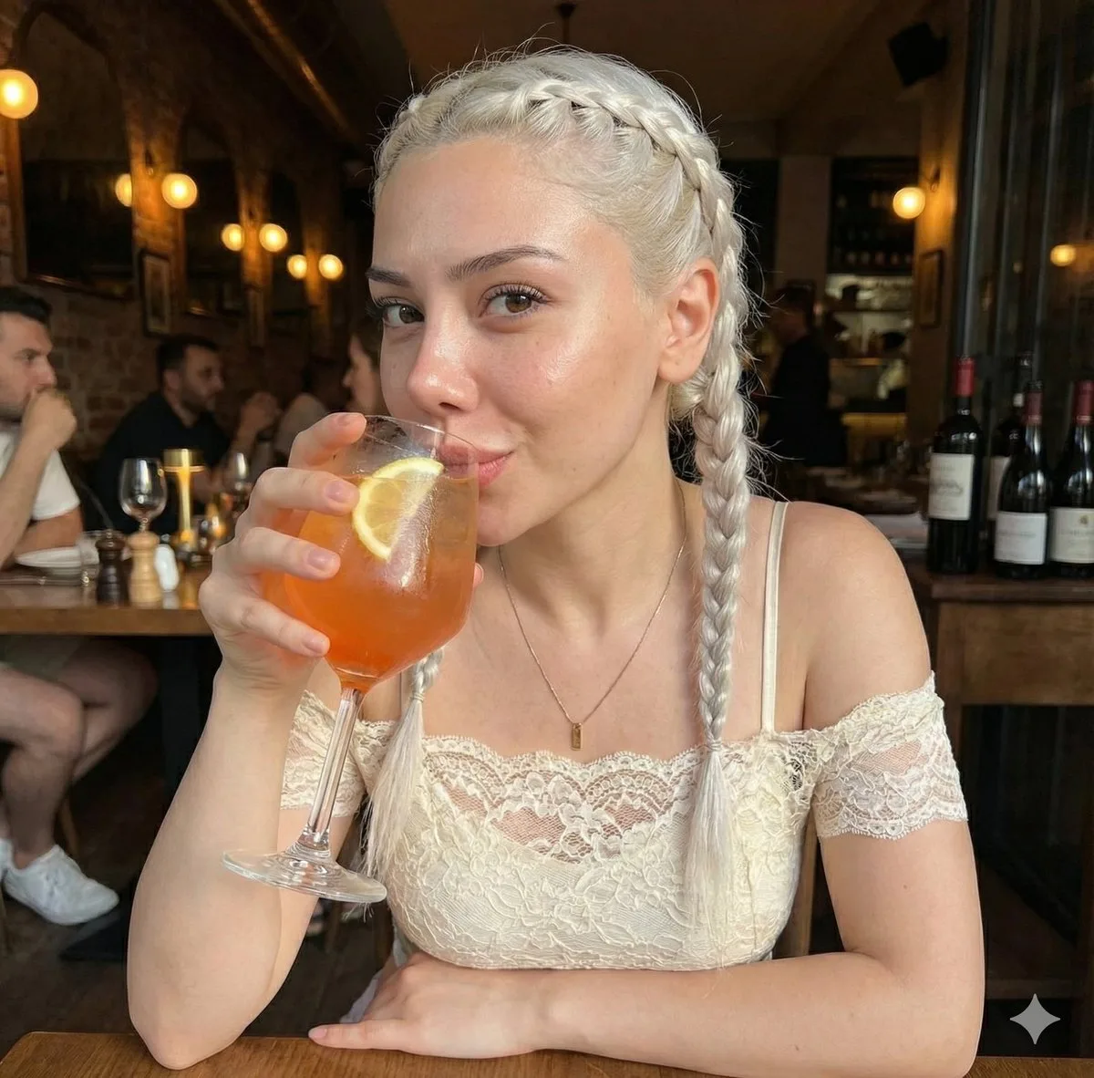 Warm light blonde drinking cocktail — After