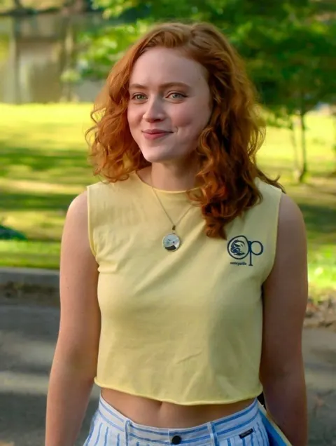 Warm sunny park redhead girl