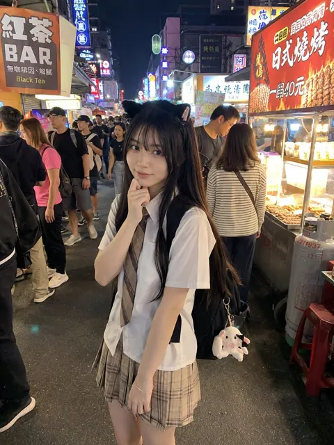 Japanese girl cat ear headband night market street photo