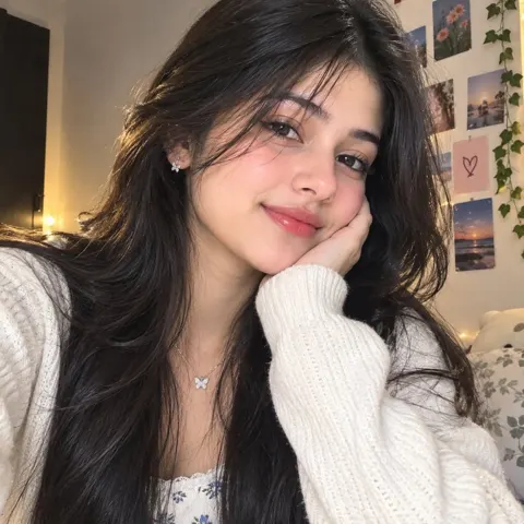 Beautiful young woman white sweater bedroom photography