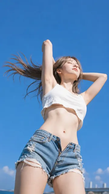 Summer fashion portrait hair spreading sky