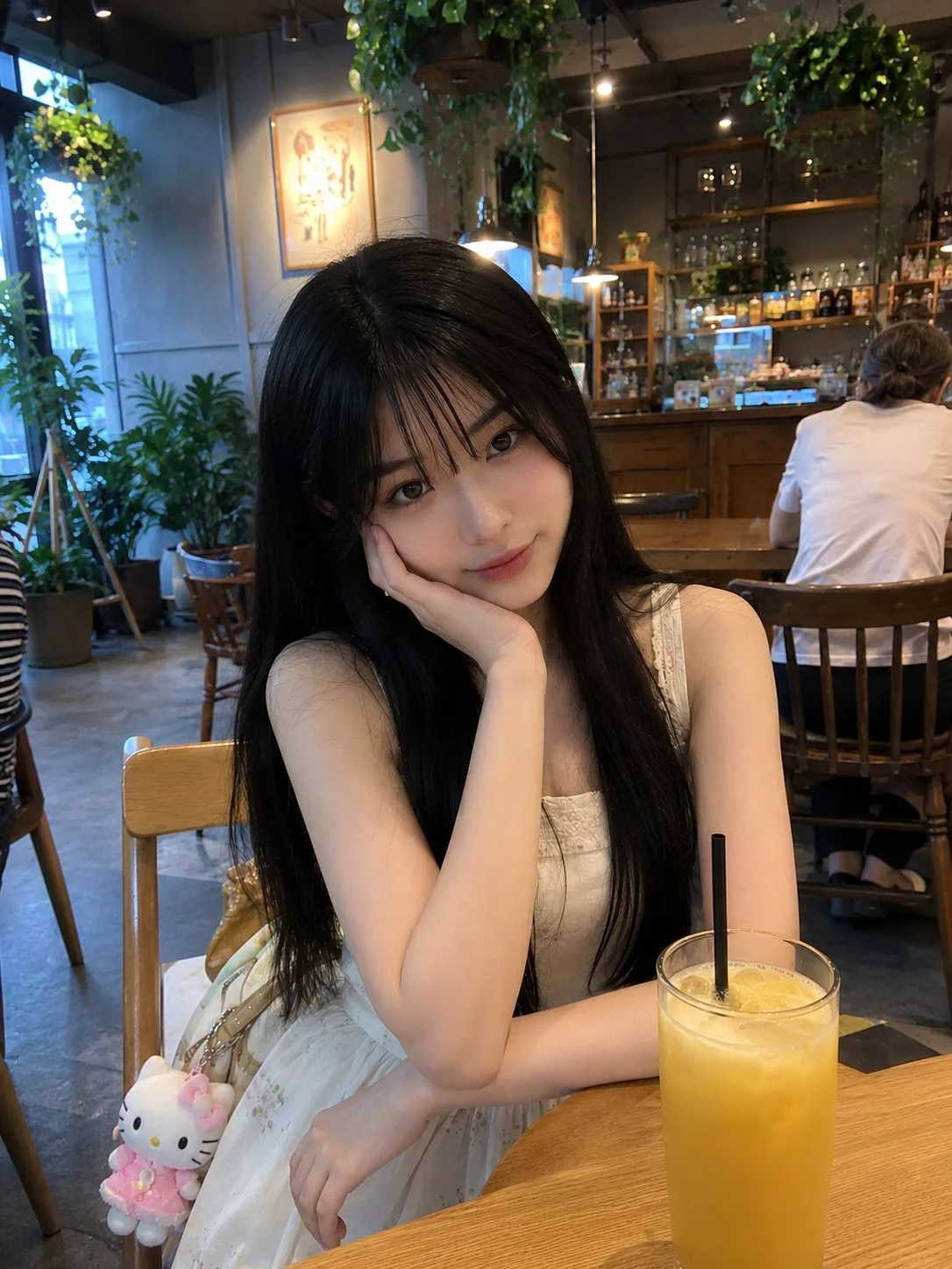 Young japanese girl modern cafe smartphone photo — After