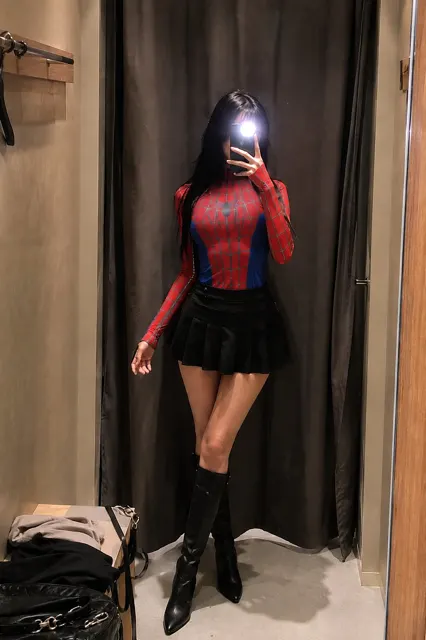 Slim woman spider bodysuit mirror selfie