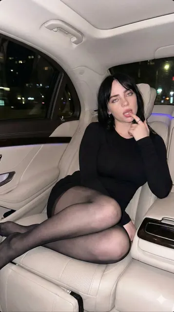 Sultry redhead luxury car