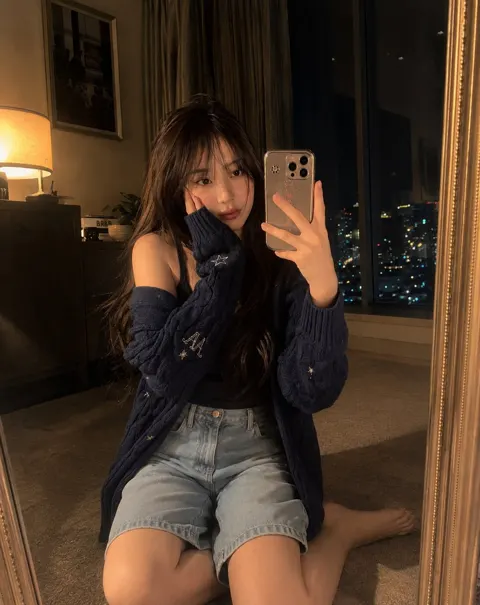 Young girl mirror selfie golden hour ethereal photo