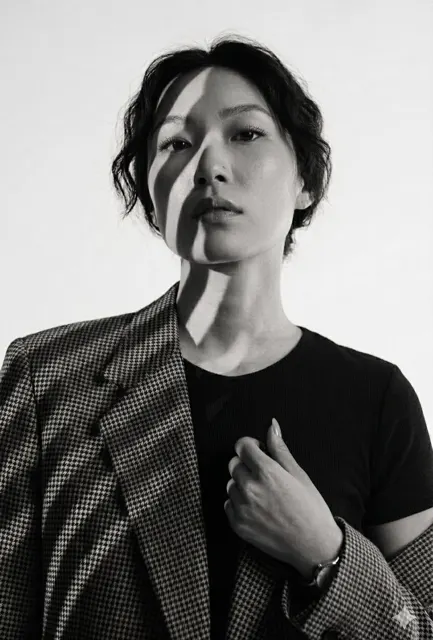 High contrast black and white editorial fashion portrait houndstooth blazer