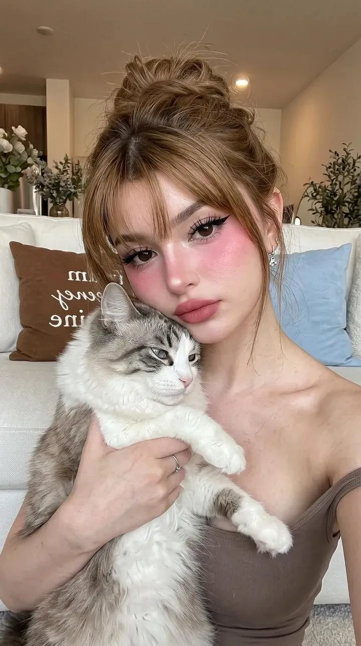 Ultra realistic girl holding cat indoor selfie portrait — After