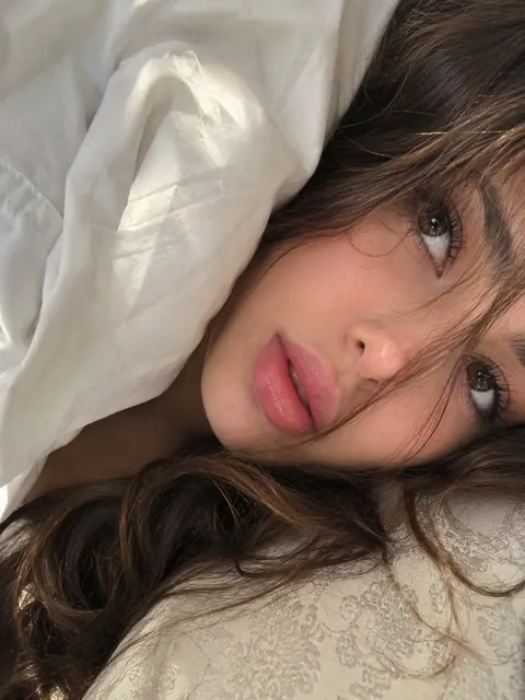 Ultra realistic woman bedroom selfie portrait