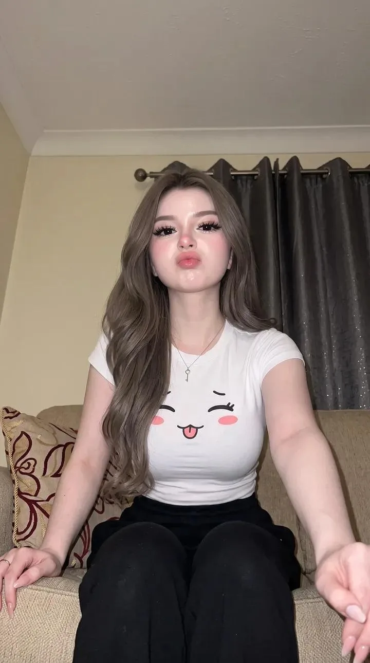 Realistic woman selfie glass skin baby tee — After