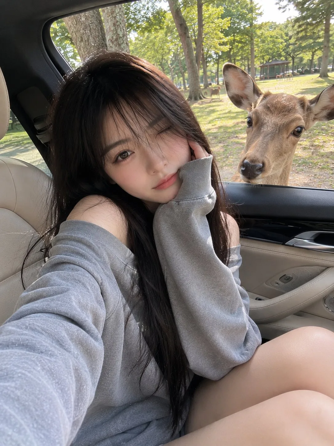 Japanese girl luxury car deer smartphone photo — After