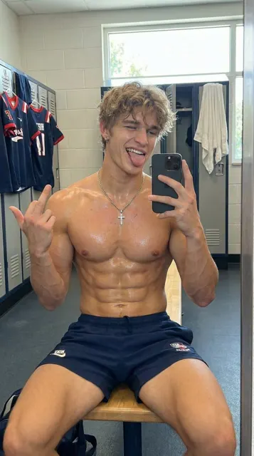 Gym locker room muscle selfie