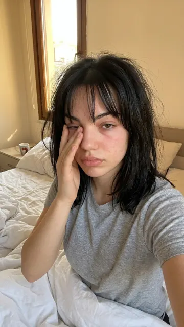 Sleepy morning bare face selfie