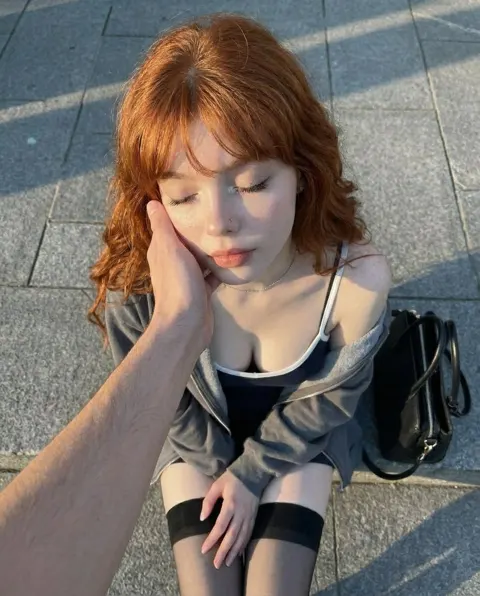 Golden hour redhead girl