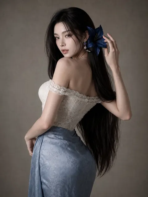 Minimalist gray wall east asian female fashion portrait