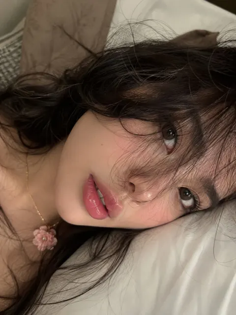 Ultra realistic east asian woman intimate selfie glossy lips