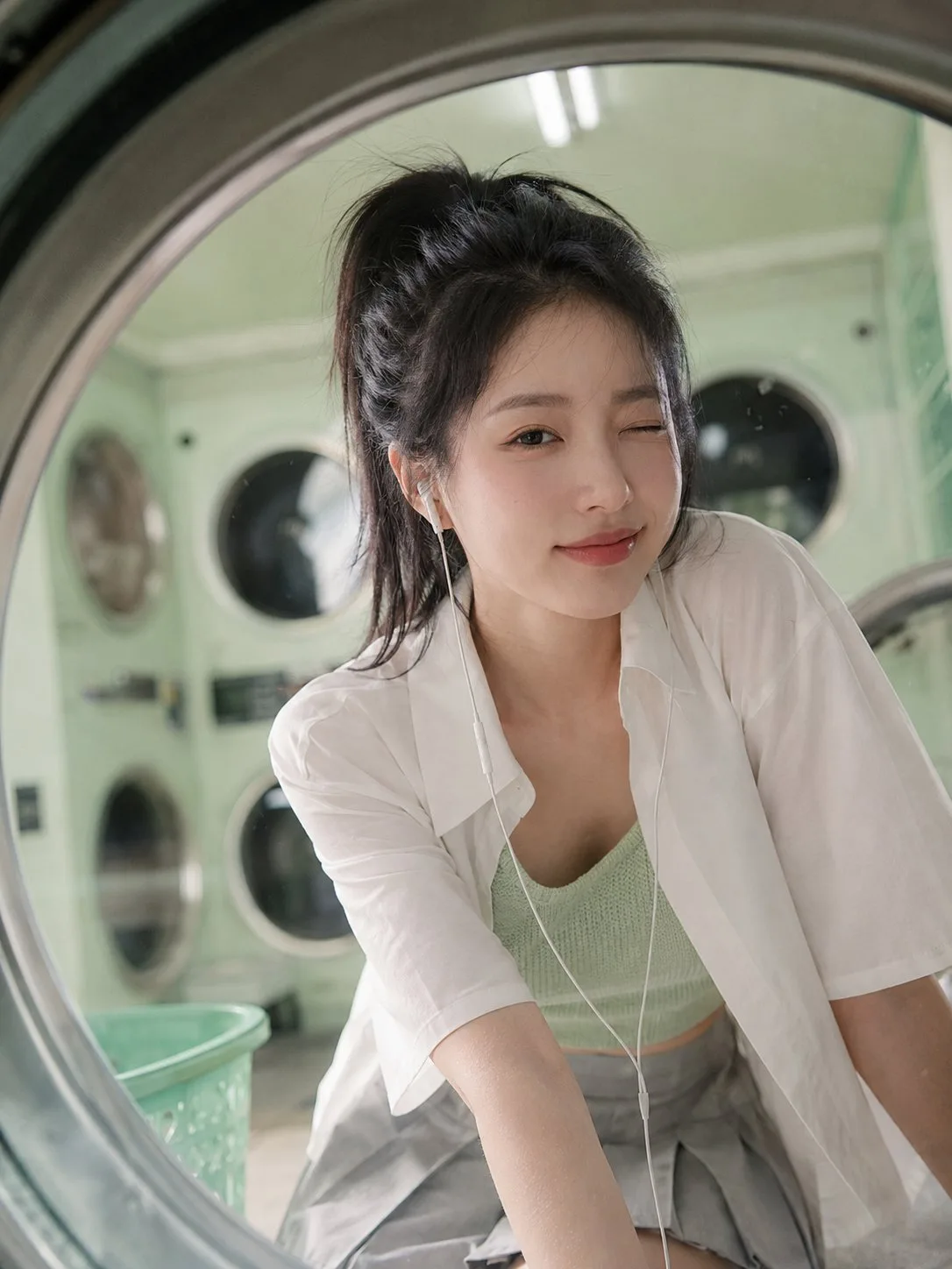 Korean woman mint green laundromat film photography — Sonra