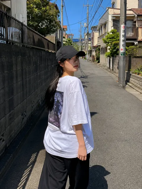Beautiful japanese woman red varsity jacket street photography