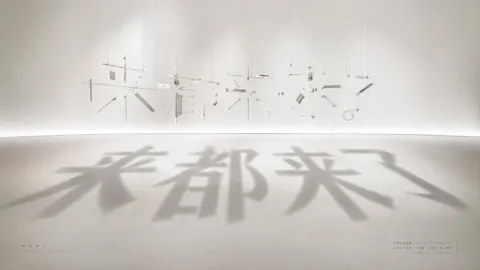 Restrained calm exhibition style suspended installation