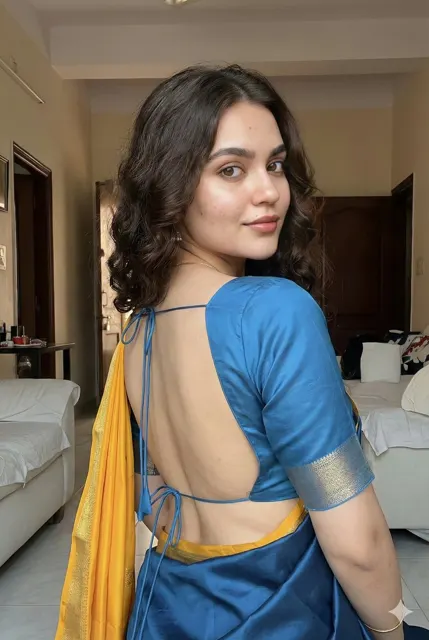 Elegant pink saree over shoulder