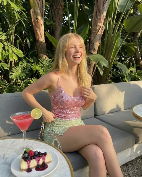 Tropical golden hour blonde girl