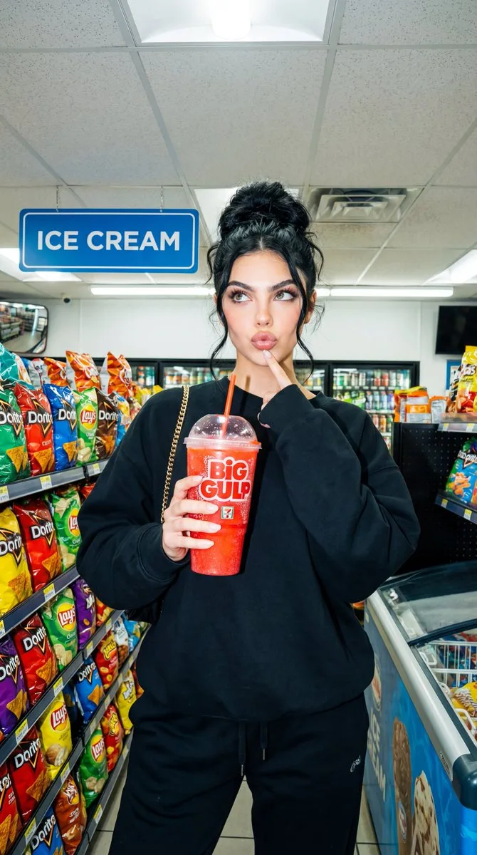 Neon convenience store selfie — Sonra