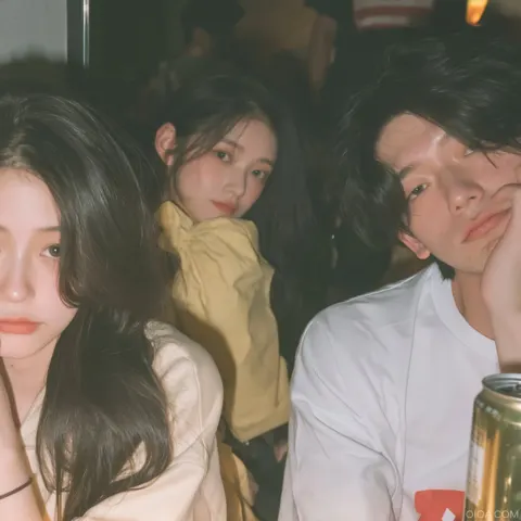 Warm soft focus east asian group portrait