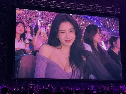 Immersive image of fan on concert big screen