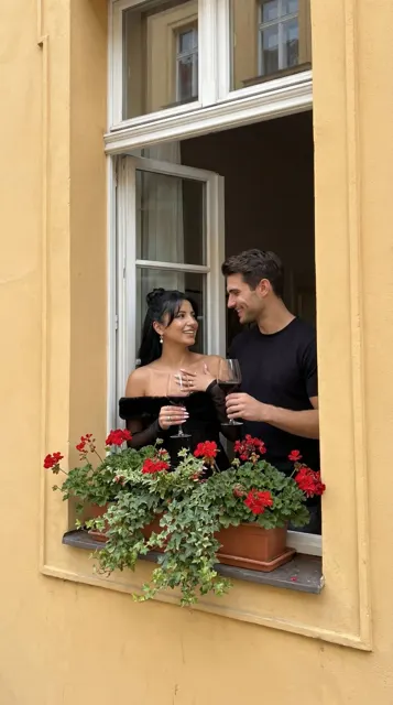 Romantic couple yellow facade