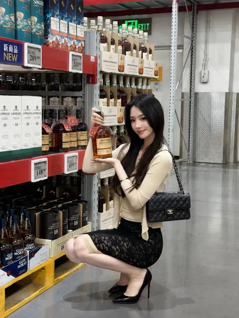 East asian woman warehouse supermarket shopping candid