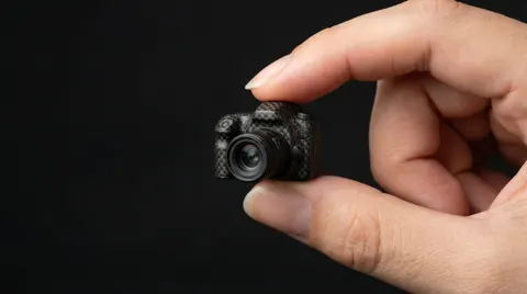 Finger miniature art ad