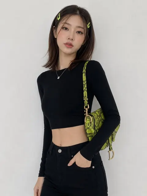 Young korean woman lime green snakeskin bag