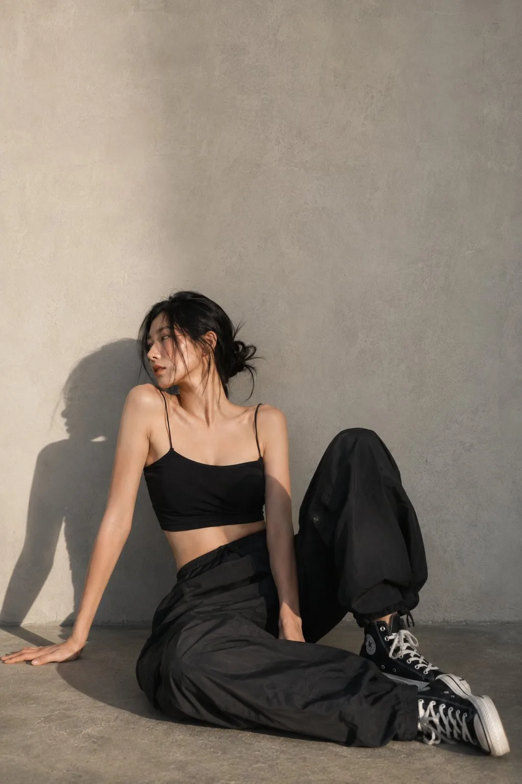 Minimalist techwear east asian woman fashion editorial — Sonra