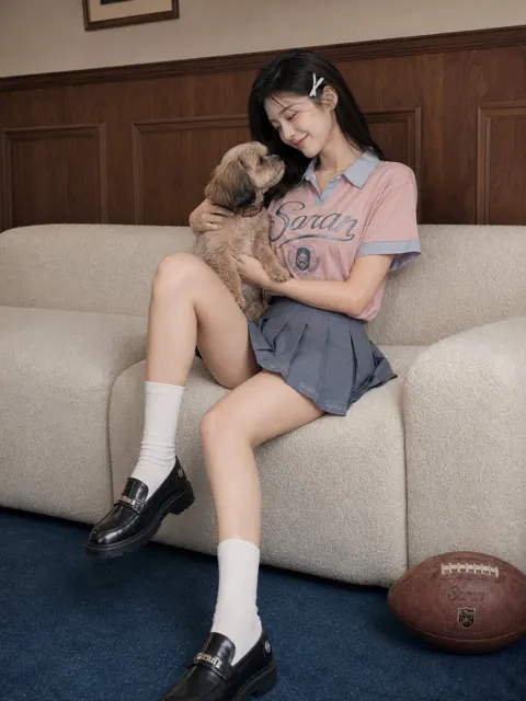 Retro preppy lifestyle portrait coral pink sofa