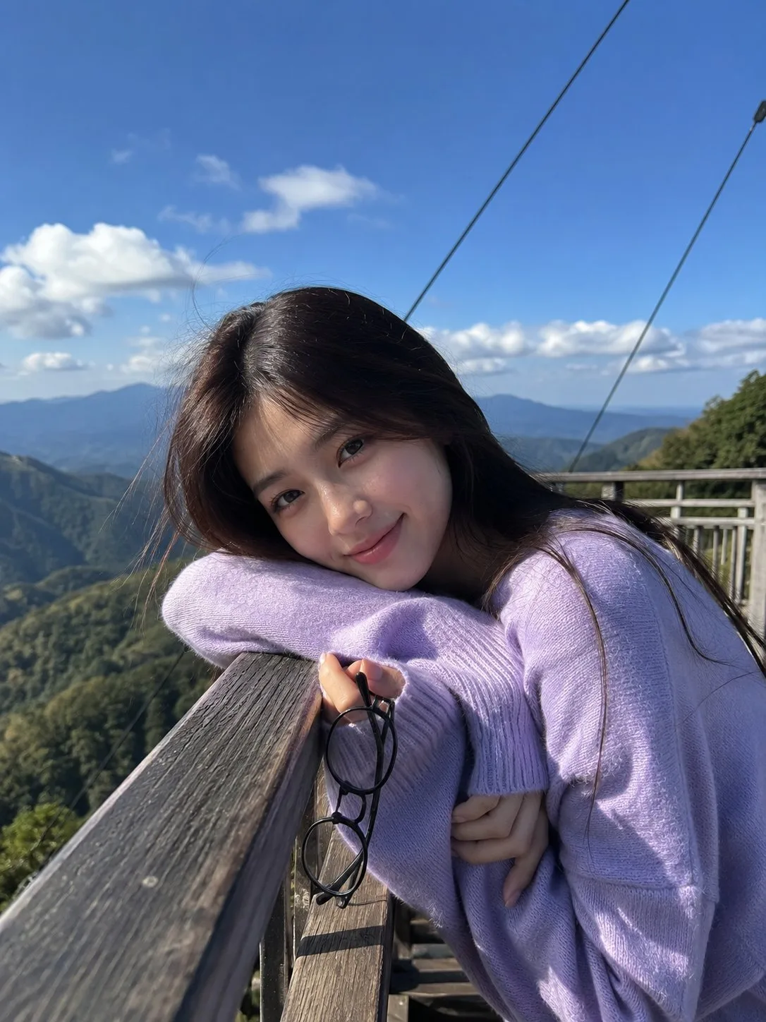 East asian woman mountain portrait lavender knit sweater — After