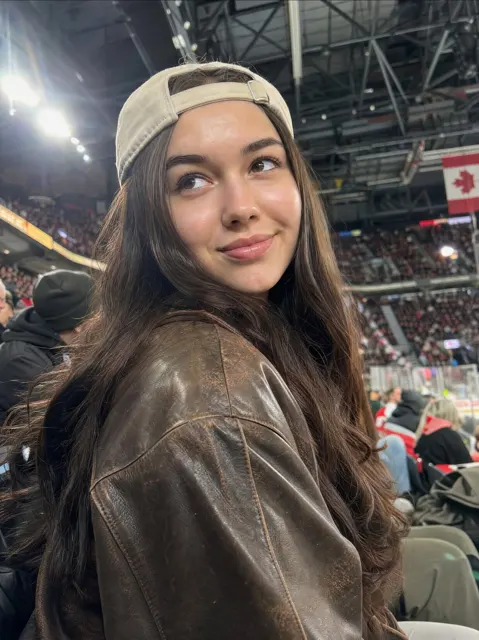 Realistic woman sports arena leather jacket cap