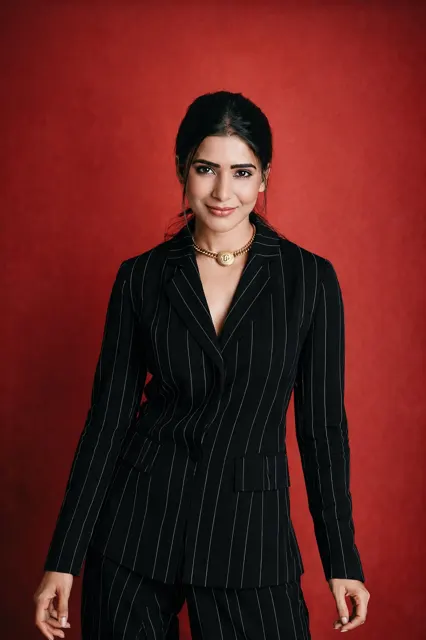 Female studio portrait navy striped pantsuit
