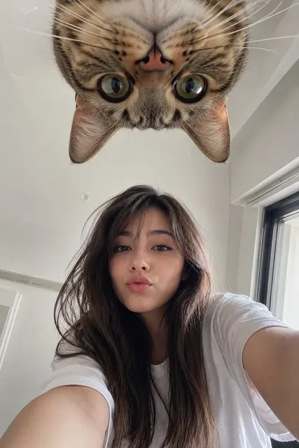 Japanese girl upside down cat low angle selfie