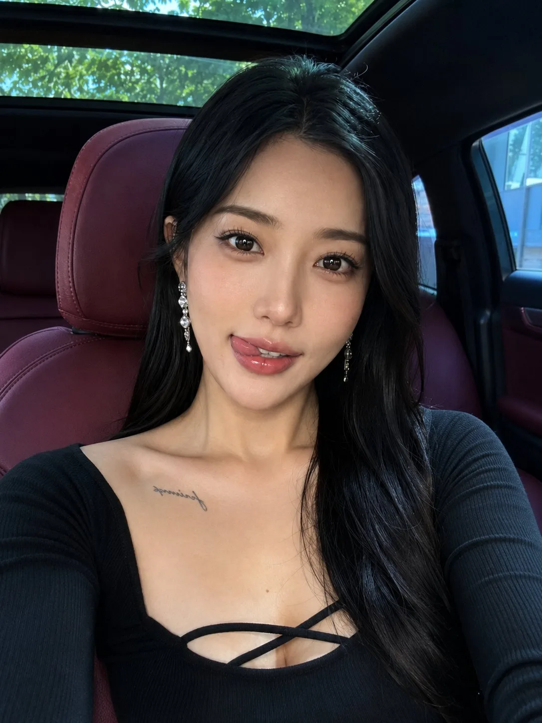 Elegant east asian woman luxury car playful selfie — After
