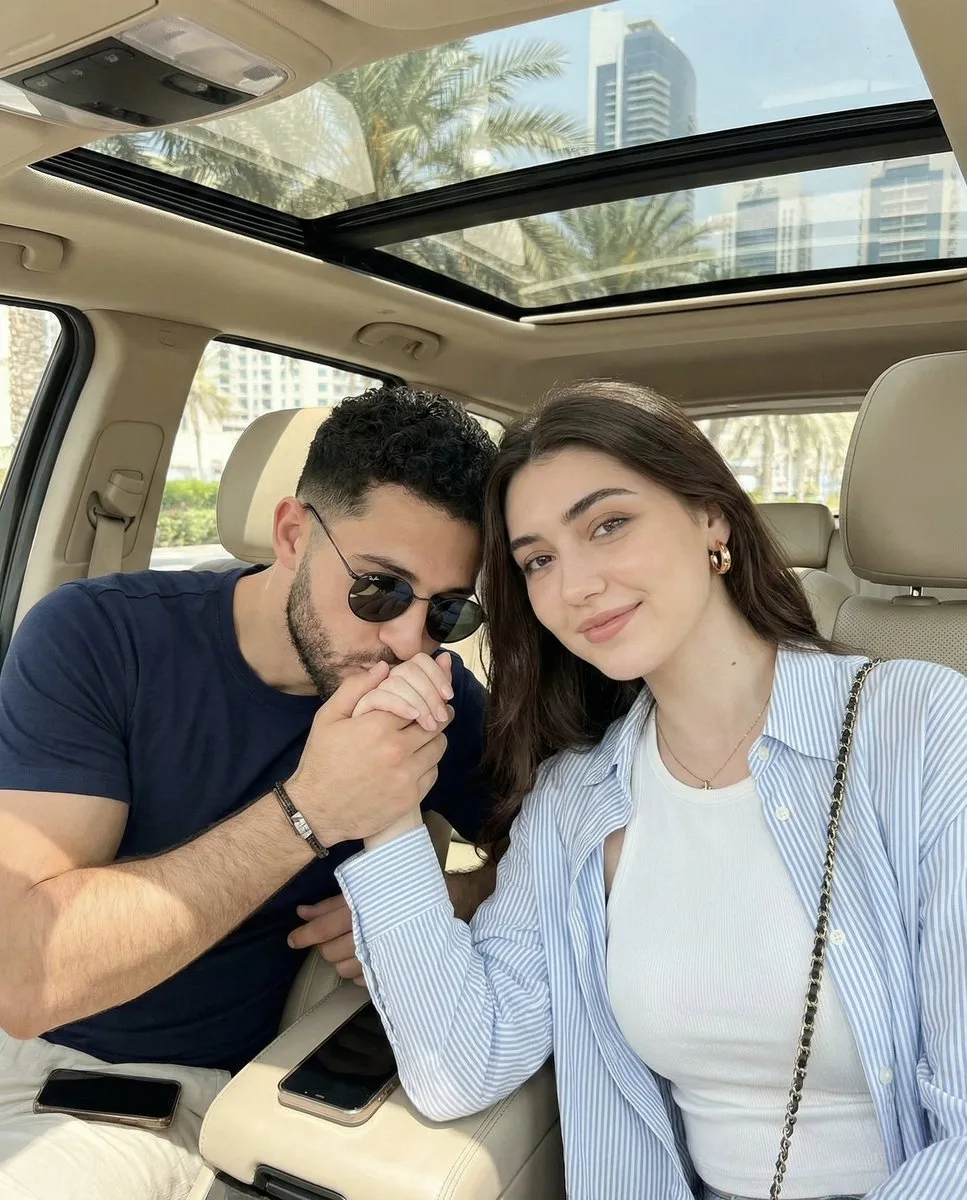 Romantic hand kiss in car — After